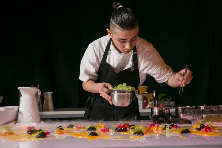 Wolfgang Puck Catering Staff Carefully Plating Dishes
